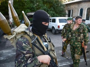 Pro-Russian rebels prepare arms for the the assault on the positions of Ukrainian army in Donetsk airport, eastern Ukraine, on Sunday. Reader says Russia can make the case that Ukraine is a part of Russia.