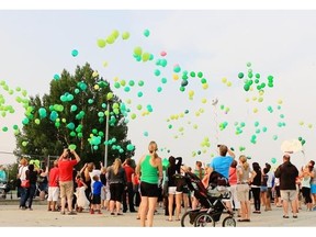 Over 100 Calgarians released balloons at the Parkhill Stanley Park Community Hall in a memorial to Nathan O’Brien and his grandparents Kathy and Alvin Liknes.