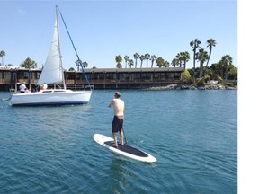 Paddleboarding and sailing in Mission Bay, Paradise Point Resort, San Diego.