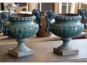 Pair of French Urns: These double lobed handled, 19th Century urns add glamour to a deck.