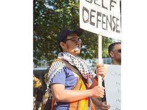 Pro-Palestinian supporters gathered again at City Hall for a silent protest in Calgary on Friday, Aug. 1, 2014.