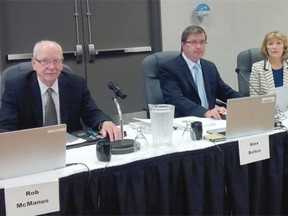 A panel of the Alberta Energy Regulator, comprised of Bob McManus, left, Alex Bolton and Christine Mackin, at a hearing at Lister Hall on the University of Alberta campus on Wednesday. The panel will decide whether to approve the $3 billion Grand Rapids pipeline project to bring bitumen (900,000 barrels a day) to the Edmonton area.