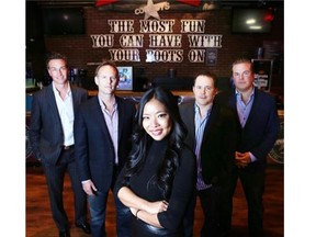 The new part owners of Cowboys Dance Hall in Calgary are pictured from left, Dave Urner, Christian Darbyshire, Scarlet Lee, Andy McCreath and Matt Grieve.