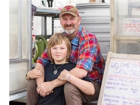 Paul Hughes of Grow Calgary, pictured with his son Mac, is hoping to create the world’s largest urban farm here in Calgary.