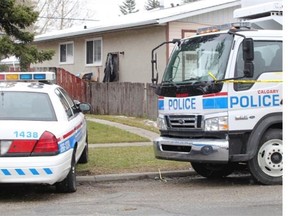 Police remained at the scene Monday of a double murder the previous evening in southeast Calgary.