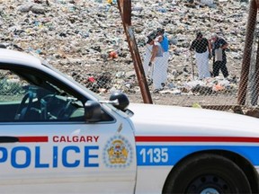 Police search an area of the Spyhill landfill as part of the investigation into the disappearance of Nathan O’Brien and his grandparents.