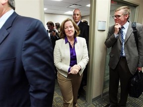 Premier Alison Redford walked away from the scrum after speaking following the official opening of SORce (the Safe Communities Opportunity and Resource Centre) on September 19, 2013.