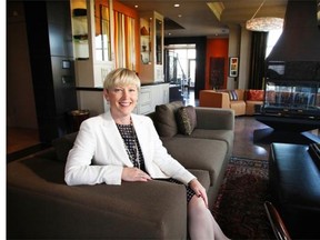 Realtor Rachelle Starnes on the patio of the record $4.4 million penthouse she recently sold in the Princeton Hall building in Eau Claire.