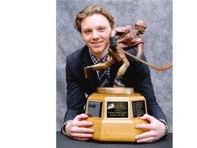 Sam Reinhart of the Kootenay Ice poses with his trophy after being named WHL Player of the Year. In this mock draft, the supreme talent winds up going to the Calgary Flames, where his famous father Paul Reinhart once played a starring role.