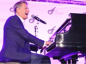 Renowned musician and music producer David Foster talked about his career and played some of the many hits he has written and produced over his career during a noon hour event at WestJet to promote a benefit gala for the David Foster Foundation on September 27th in the WestJet hanger. The David Foster Foundation is a non-profit charitable organization dedicated to providing financial support for non-medical expenses to Canadian families with children in need of life-saving organ transplants.