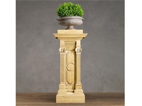Restoration Hardware 
 A carved oak plinth that makes a statement, and can be used to hold artwork, plants or as a side table.