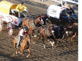 Rick Fraser races to the finish line during heat 4 at the GMC Rangeland Derby at the Calgary Stampede on Monday night.