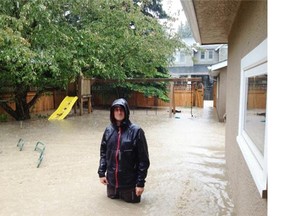 Roxboro resident Joe McFarland in his flooded home.