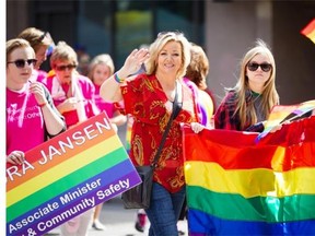 MLA Sandra Jansen walks the parade route during the 24th Annual Pride Parade on 8th Avenue in downtown Calgary on Aug. 31, 2014.