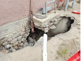 A sink hole caused by last June’s flood has expanded under a building that used to house Vespucci Consignment Inc. in High River, threatening the integrity of the structure.