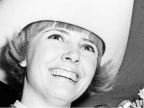 Stampede Queens - 1960s: Patsy Allan, 21, beams proudly as she accepts a bouquet of flowers and the title Miss Calgary Stampede for 1967.