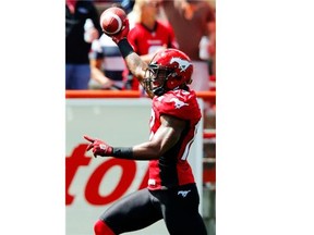 Stampeders receiver Maurice Price gallops to the end zone and celebrates his 102-yard touchdown against the Montreal Alouettes Saturday at McMahon Stadium. Sunday, the news wasn’t good as Price is out with a broken hand, suffered on a different play.