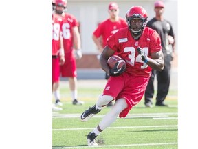 New Stampeders running back Martell Mallet runs the ball up field during rookie training camp Friday at McMahon Stadium. Mallett is hoping for a comeback after missing the past two seasons due to an Achilles injury.