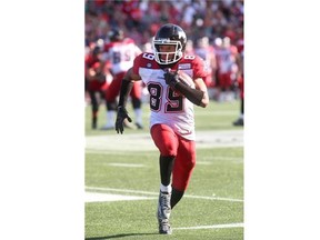 Stamps wide receiver Sederrik Cunningham chugs down the field against the Ottawa RedBlacks on Sunday.