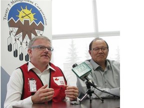 Steve Armstrong, Provincial Director at Canadian Red Cross, and Treaty 7 Grand Chief Charles Weaselhead of the Blood Tribe at the Treaty 7 Management Corporation branch office in Calgary to discuss the flood impact on First Nations and relief efforts in those communities.