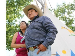 Stoney Nakoda Nation members Keith and Jamie Lefthand have set up their teepee in Indian Village for the during of the Calgary Stampede. Keith’s father was an infant in 1912 when he first took part in the Stampede and now Keith is helping to pass down the tradition of involvement to his grandchildren.