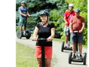 Susana Ranca leads friends visiting from her native Romania on a Segway tour on the Elbow River pathway. The group was out with River Valley Adventure Co./Canada West Segway, a new enterprise based out of the Talisman Centre offering instruction and city tours on the motorized devices.