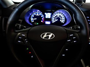 The 7-inch touchscreen on the 2014 Hyundai Veloster Turbo does triple duty as a GPS, an entertainment centre and a screen for the rear camera.