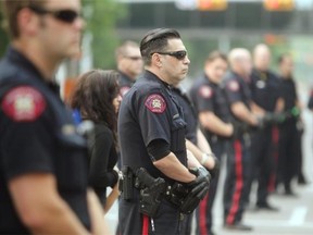 Tempers flared between pro Palestinian and pro Israeli protesters who took to the steps of Calgary City Hall on July 18, 2014. A number of skirmishes broke out between the two factions as the group was protesting Israel’s bombing of Gaza.