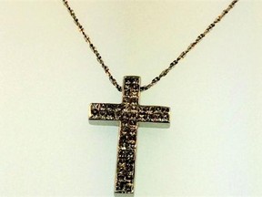 This 14-karat white gold diamond cross necklace from Breslauer & Warren is $2,172.50, instead of the regular retail price of $3,950, on the Herald’s Like It Buy It e-commerce site.