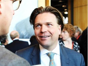 MLA Thomas Lukaszuk, right, mingled with the crowd of 1,800 at the Telus Convention Centre prior to the annual party Leaders Dinner on May 8, 2014. Lukaszuk is mulling a run at party leadership.