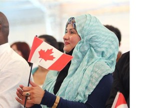 In Tuesday’s Canada Day ceremony at heritage Park, 75 immigrants celebrated becoming Canadian citizens.