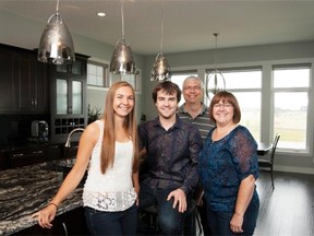 The Unick family, including Katie, Adam, Mike and Marie, love their new home at Heritage Pointe thanks in large part to the proximity to the University of Calgary.