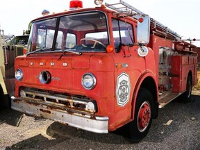 A vintage fire truck originally from Nanaimo is one of five the Firefighters Museum Society of Calgary is selling to focus on preserving trucks and pieces related to the history of firefighting in Calgary. (Gavin Young/Calgary Herald)