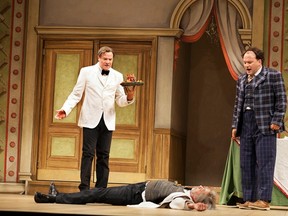 Gareth (Kevin Rothery), left, and Francis (Kevin Corey) ponder what to do with a possibly lifeless Alfie (Trevor Rueger) in One Man, Two Guvnors, the hilarious, slapstick-filled play that opens Theatre Calgary's season.