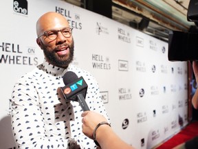 Actor Common, who plays Elam Ferguson, walked the red carpet during the premiere of Hell on Wheels at the Grand Theatre in 2013. His father, Lonnie Lynn, died on Friday.