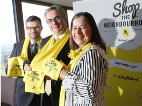 Adam Legge, president and chief executive of the Calgary Chamber of Commerce, left, Julien Billot, president and chief executive of Yellow Pages and Annie MacInnis, chair of Calgary’s Business Revitalization Zones during the launch of Shop The Neighbourhood in Calgary.