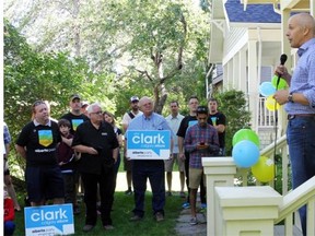 Alberta Party leader Greg Clark announced he enlisted Stephen Carter, a strategist for Redford, for his campaign team. He is seen holding a campaign kickoff on Sept. 6 on his front lawn.