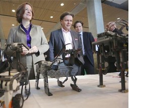 Alberta Premier Alison Redford and deputy premier Thomas Lukaszuk at the University of Calgary on Oct. 9, 2013. The university said an expansion of its engineering school is needed to meet demand from both students and employers.