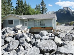 Approximately 75 per cent of the homes in the small hamlet of Exshaw suffered damage in the 2013 flood and a handful of residents who have yet to have their damage claims resolved.