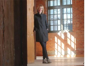 Architect Kate Thompson of the Calgary Municipal Land Development Corporation led a tour of the historic Simmons Building on Wednesday, Oct. 7, 2014.