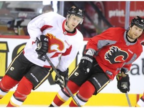 Calgary Flames centre Matt Stajan, left, skated alongside defenceman Dennis Wideman during practice on Wednesday.