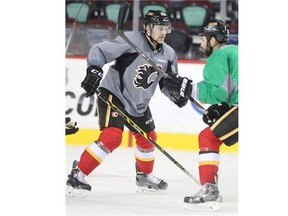 Calgary Flames defenceman Patrick Sieloff, in grey, skated with teammates during training camp at the Scotiabank Saddledome on Wednesday. The 20-year-old is vying for a depth position on Calgary’s defence this season.