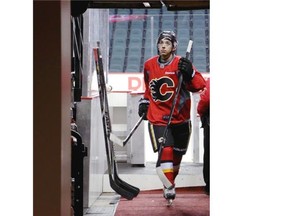 Calgary Flames rookie Johnny Gaudreau leaves the ice after Flames practice on Tuesday. He will walk out of that tunnel for the first time in an NHL regular season game on Wednesday night when the Flames host Vancouver.
