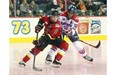 Calgary’s Rebecca Johnston keeps the puck away from Montreal’s Caroline Ouellete in Canadian Women’s Hockey League action at Scotiabank Saddledome on Sunday. Calgary won 3-2, taking two of three games from their rivals during a weekend series.