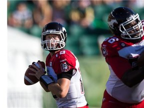 Bo Levi Mitchell #19 of the Calgary Stampeders looks to pass in a game between the Calgary Stampeders and Edmonton Eskimos in week 11 of the 2014 CFL season at Commonwealth Stadium on September 6, 2014 in Edmonton, Alberta, Canada.  (Brent Just/Getty Images)