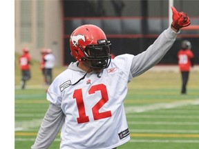 Calgary Stampeders linebacker Juwan Simpson gives a thumbs up during practice at McMahon Stadium on Thursday. The veteran will play in his 100th CFL game on Saturday in Winnipeg.