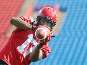 Calgary Stampeders receiver Maurice Price hauls in a short pass during practice on Thursday.