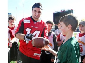 Calgary Stampeders running back Matt Walter, seen signing a football for William Ellis earlier this month, is primed for a statement game at the controls of the team’s running game.