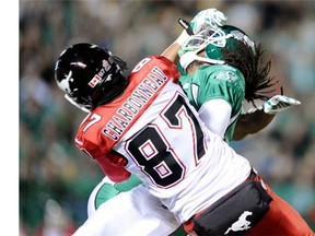 Calgary Stampeders wide receiver Simon Charbonneau-Campeau runs into Saskatchewan Roughriders defensive back Marshay Green during a game earlier this month in Regina. It left him in a crumpled heap and out of the lineup ever since, but he aims to return on Saturday against Winnipeg.