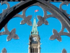 The Centre Block’s Peace Tower is shown through the gates of Parliament Hill. A heavy piece of stained glass landed on the floor of the House of Commons in February 2013 and it’s feared that parts of the Centre Block could simply collapse due to lack of maintenance.